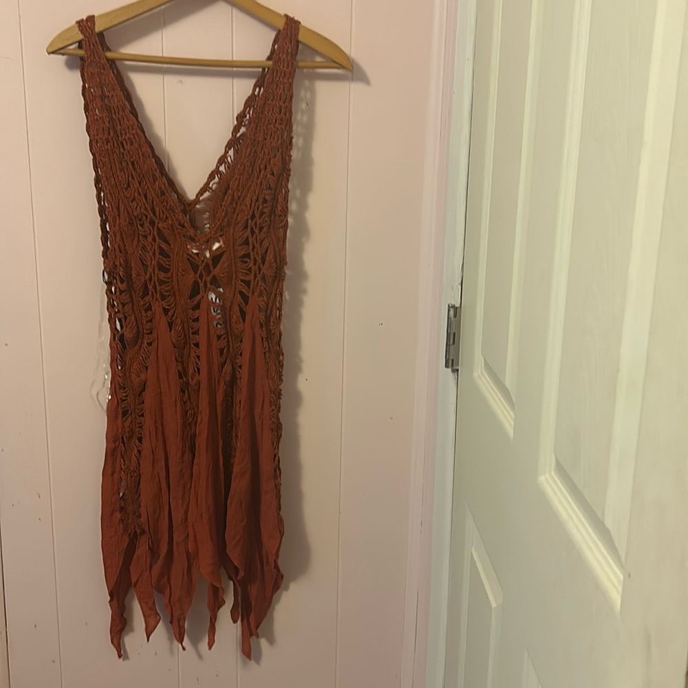 This is a top from Purple Snow. Brand new